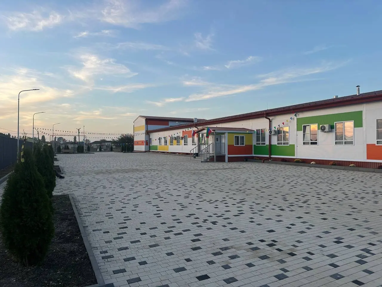 The yard and school entrance in the evening